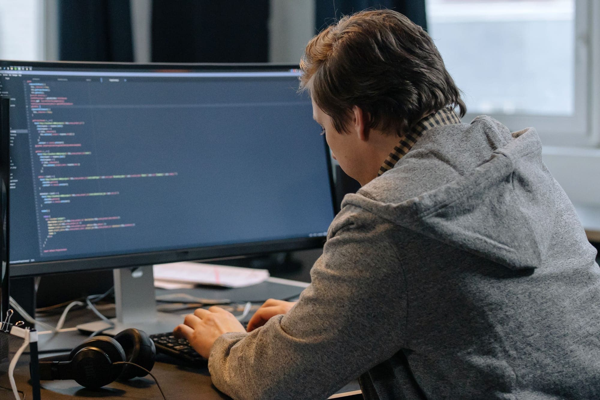 Programmer writing code